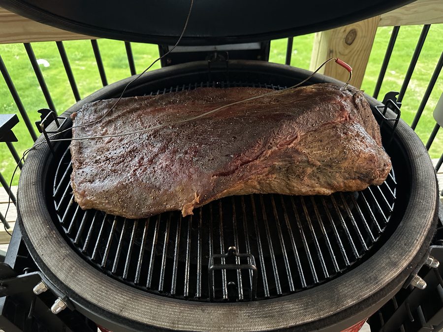 A frenched rack of lamb on the cutting board
