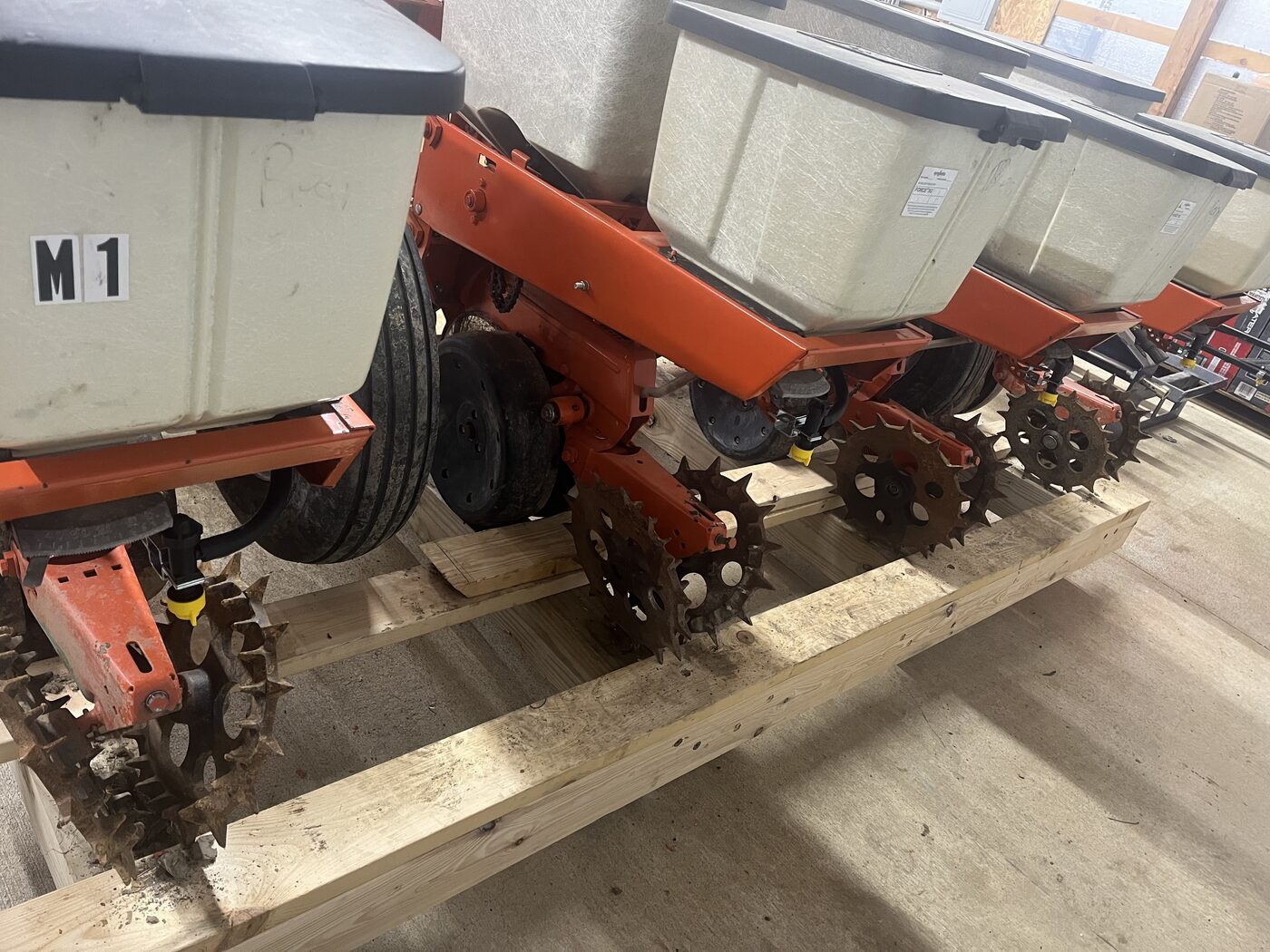 The Tompkins Farm no-till planter, fitted with row units that drill seed straight into living clover