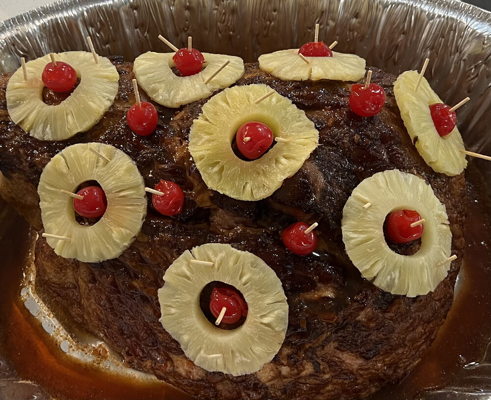 A holiday ham studded with pineapple rings