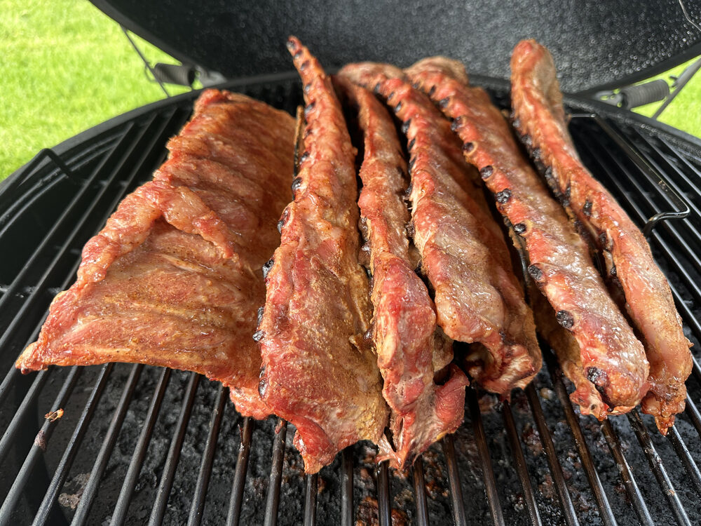 Racks of pork ribs on the grill