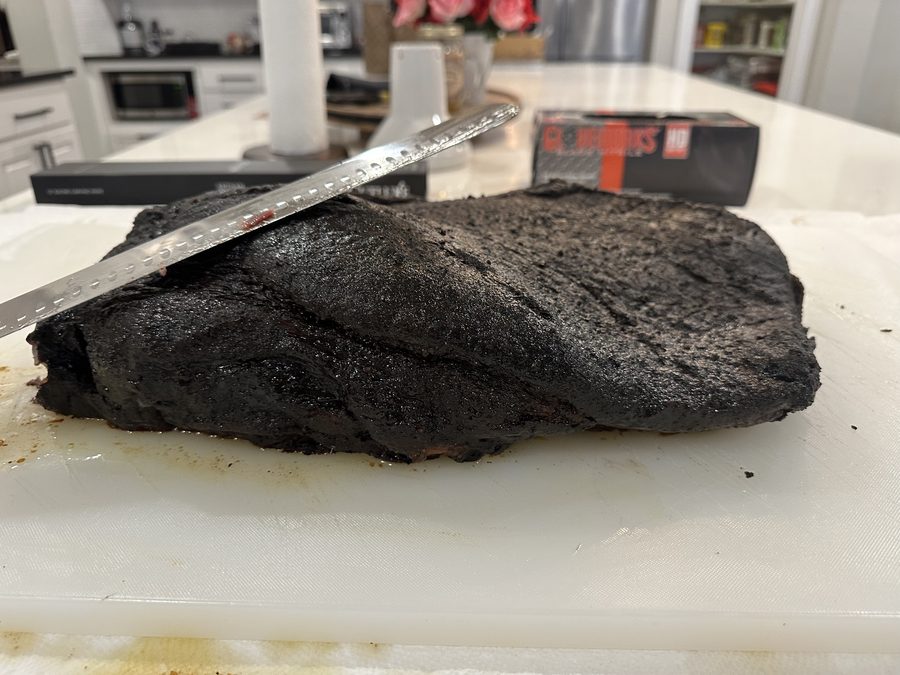Sliced grilled steak on a cutting board
