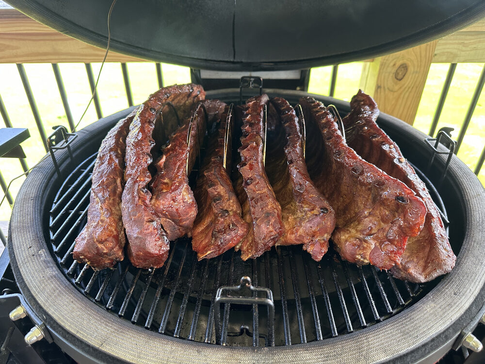 Steaks searing over the coals